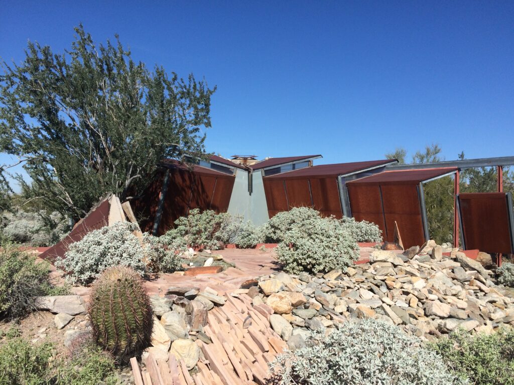 Cor-ten works well in the desert. The solid wall faces south and east to create a buffer from the heat.