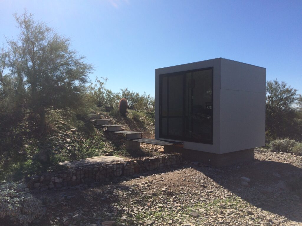 Professor Aris Georges challenged a Taliesin designer to build a perfect cube. The interior planes of this shelter is said to be just that.